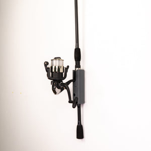 The Vertical Fishing Rod Holder Wall Mount by Pesca Innovations allows you to easily store one fully assembled fishing rod on a vertical surface.