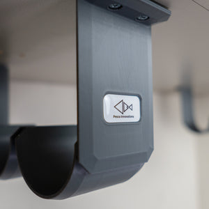 The Fly Rod Tube Holder Triple Shelf by Pesca Innovations is made in the USA.