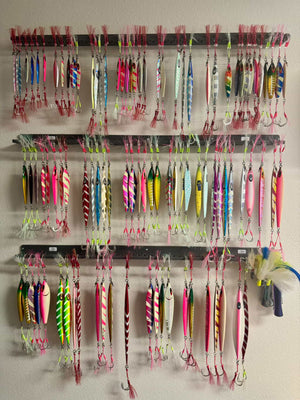 Display of various colorful fishing lures on a magnum fishing lure holder