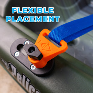 Close-up of a blue strap with an orange tie on a green kayak, with 'FLEXIBLE PLACEMENT' text above.