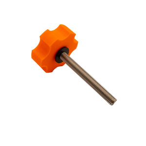 Orange plastic knob with a threaded metal shaft on a beige background