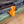 Orange kayak accessory attached to a green kayak