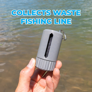 A hand holding a gray cylindrical fishing line waste holder with a metal keyring, set against a background of shallow water. Blue text at the top reads 'COLLECTS WASTE FISHING LINE'.