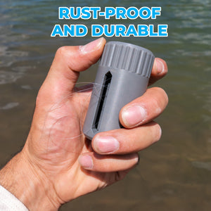 A hand holding a gray cylindrical fishing line waste holder over water, with the text 'RUST-PROOF AND DURABLE' in blue at the top.