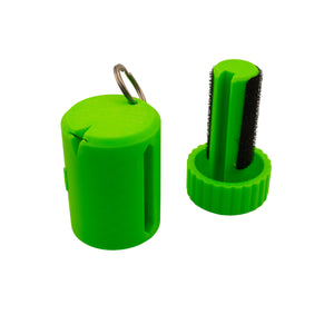 Waste line holder by Pesca Innovations showing both parts in green with a white background.