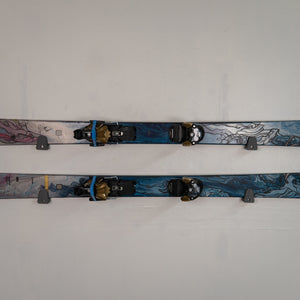Two skis with bindings on a white background