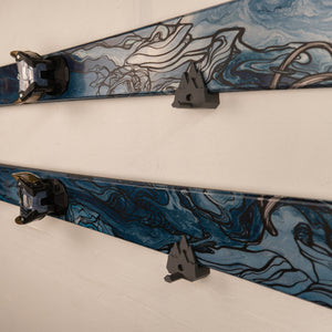 Close-up of a ski with artistic design on a white background
