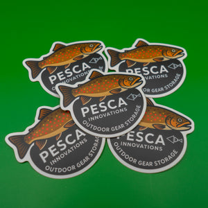 PESCA Innovations outdoor gear storage stickers with brown trout fish illustrations on a green background