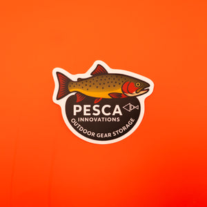 Logo of PESCA Innovations with cutthroat trout fish design on an orange background