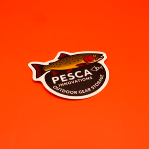 Sticker with a cutthroat trout fish design and 'PESCA INNOVATIONS' text on an orange background