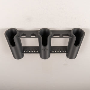 Black three-rod fishing rod holder on a light gray background