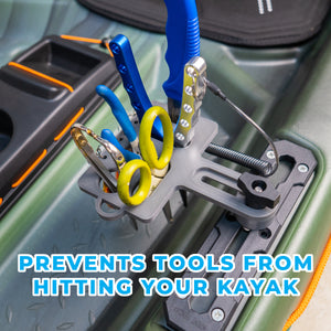 Tool holder on a kayak with tools inside, preventing them from hitting the kayak.