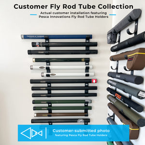 Collection of fly fishing rod tubes displayed on a wall with Pesca Innovations Fly Rod Tube Holders.