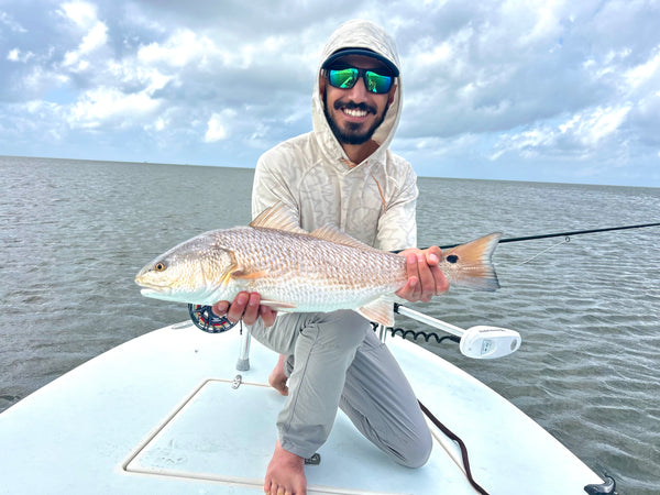 Pesca Innovations founder holding redfish