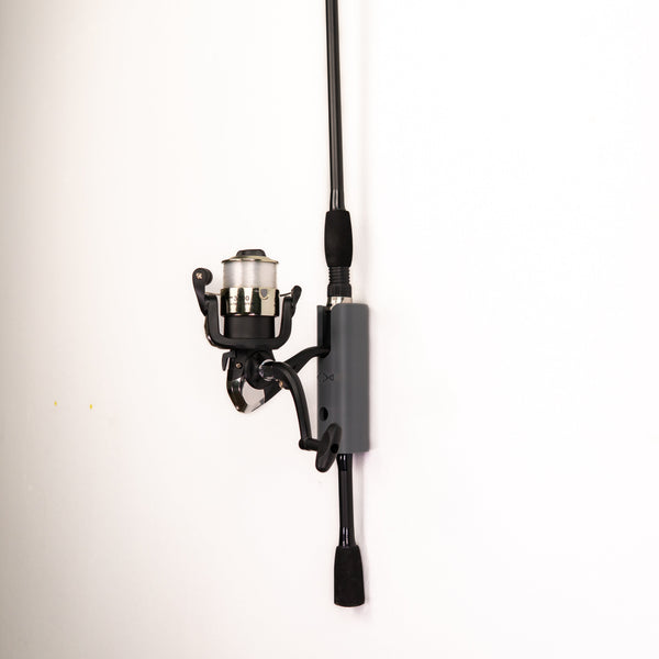The Vertical Fishing Rod Holder Wall Mount by Pesca Innovations allows you to easily store one fully assembled fishing rod on a vertical surface. 