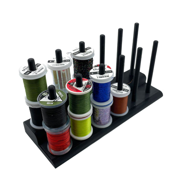 The Fly Tying Thread Holder for your Desk by Pesca Innovations is perfect for storing all of your fly tying thread spools on a table or desk. 