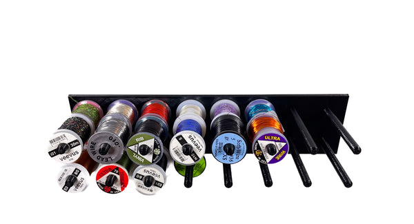 The Fly Tying Thread Holder for your Wall by Pesca Innovations is easy to install and includes all necessary hardware. 