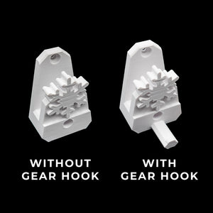 Two white plastic components, one without a gear hook and one with, on a black background.