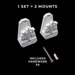 Two wall mounts with hardware on a black background