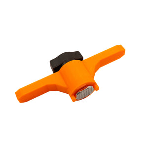 Orange and black cleat on a white background